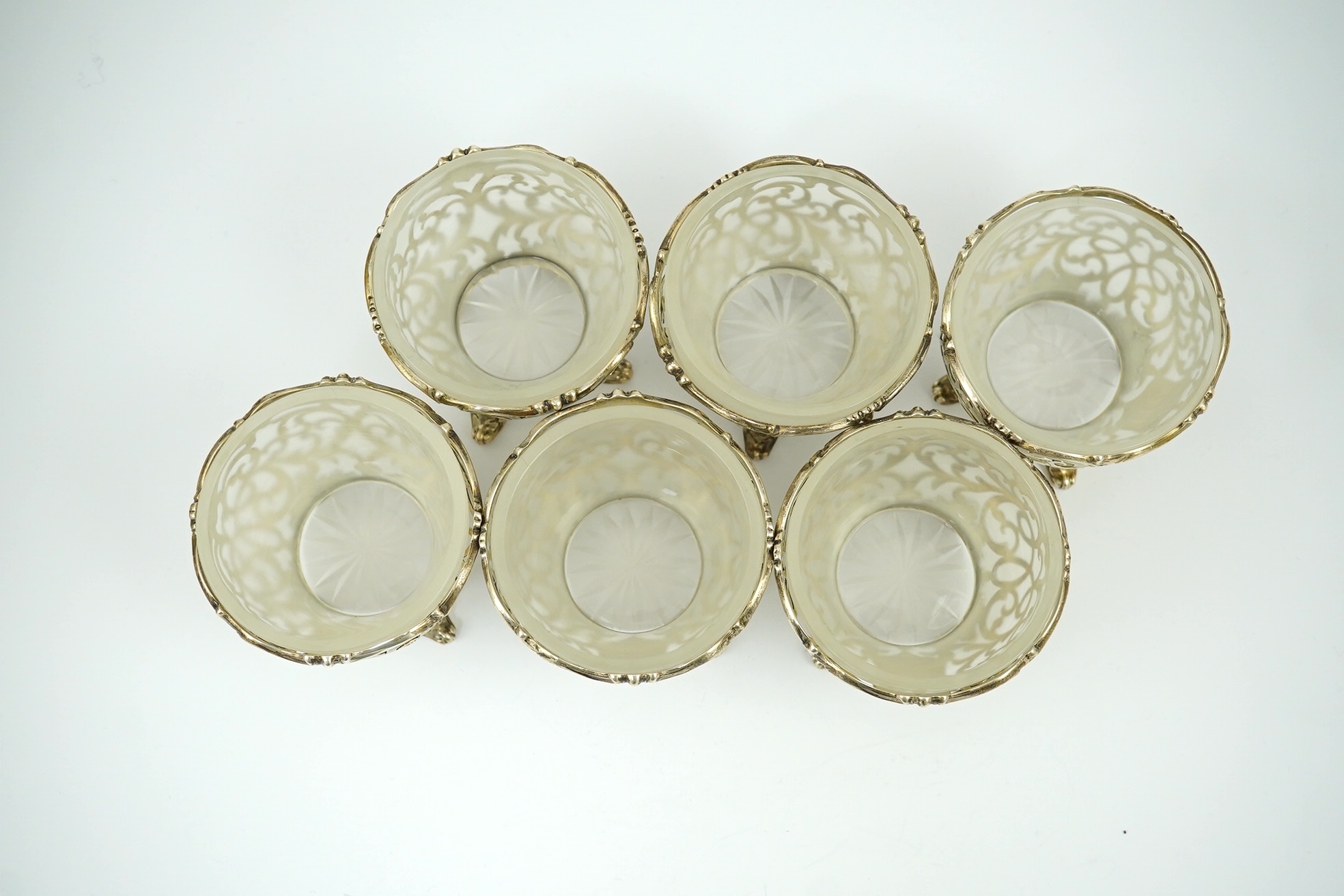 A set a six Victorian pierced silver circular sorbet dishes, with frosted glass liners, Edward & John Barnard